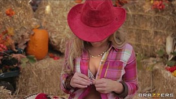 Busty blonde cowgirl Melissa Matthews goes for a roll in the hay